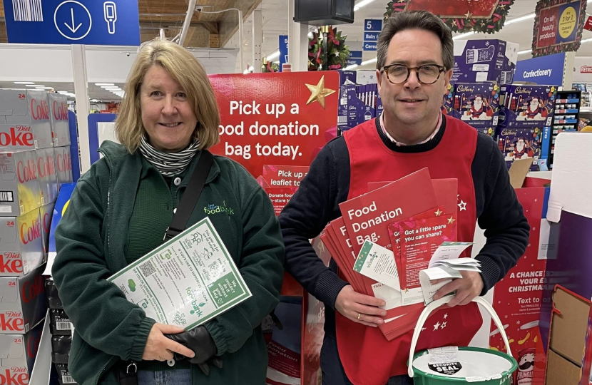 (left-to-right) Rae Goode (Secretary of East Lothian Foodbank) and Craig Hoy MSP at Tesco's Winter Food Collection